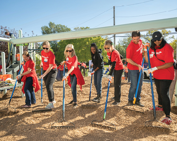 people working with rakes